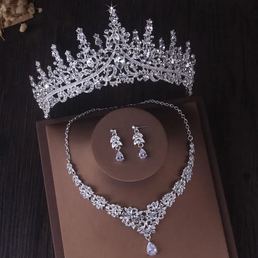 Dazzling Elegance: Silver Crystal Crown Jewel Ensemble.  Hair accessories for brides.. Hair accessories in USA. Bride accessories in USA. Bridal hair accessories in USA. Kids hair accessories in USA. Girls hair accessories. Hair products. Beautiful hair accessories.