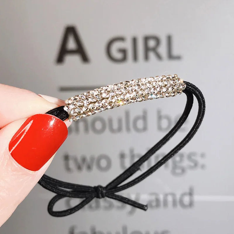 Luxe Noir Sparkle: Singular Black Diamond Elastic Hair Elegance.Hair accessories for brides. Hair accessories in USA. Bride accessories in USA. Bridal hair accessories in USA. Kids hair accessories in USA. Girls hair accessories. Hair products. Beautiful hair accessories.