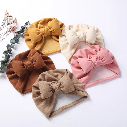 Cashmere CozyBabe Ensemble: Bow Bliss Beanies & Turban Elegance. Hair accessories in USA. Bride accessories in USA. Bridal hair accessories in USA. Kids hair accessories in USA. Girls hair accessories. Hair products. Beautiful hair accessories.