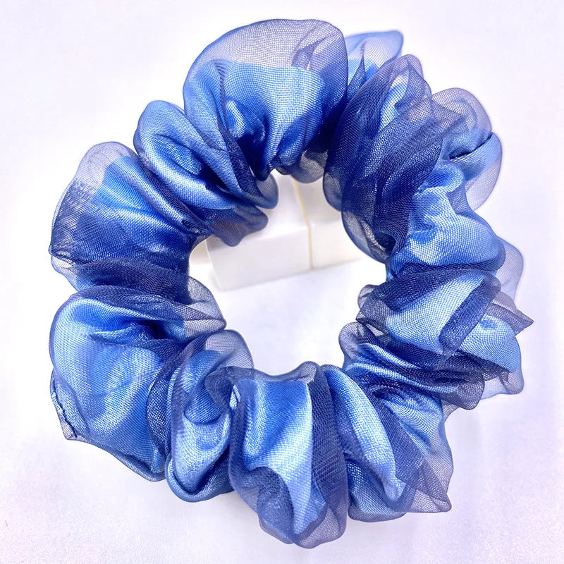 Dazzling Petal Elegance: Crystal-Embellished Floral Fabric Scrunchies. Hair accessories for brides.. Hair accessories in USA. Bride accessories in USA. Bridal hair accessories in USA. Kids hair accessories in USA. Girls hair accessories. Hair products. Beautiful hair accessories.