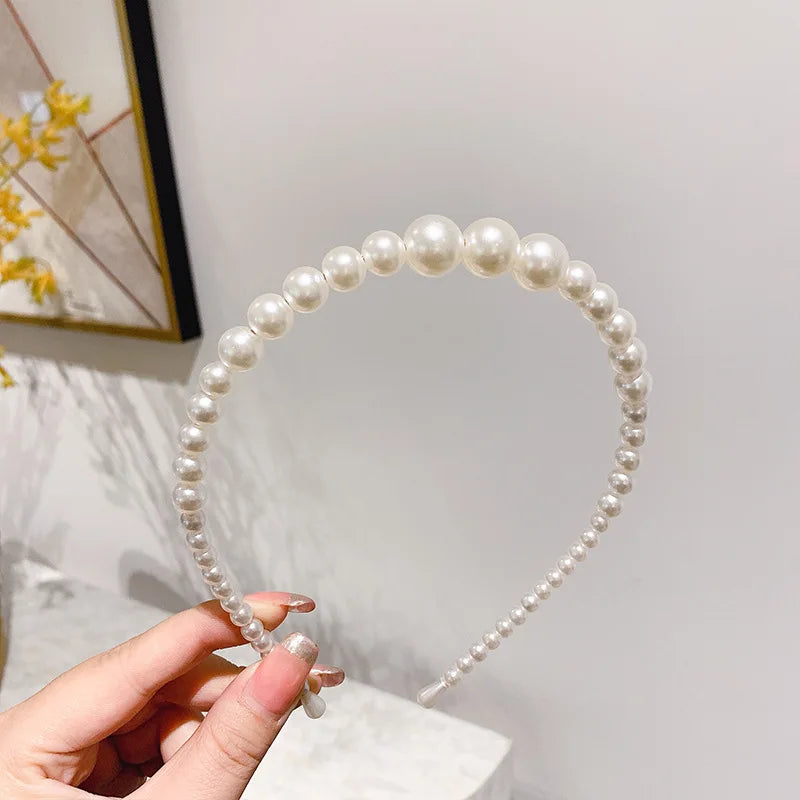 Pearl Elegance Harmony Headband. Hairxza Hair Accessories. Hair accessories in USA. Bride accessories in USA. Bridal hair accessories in USA. Kids hair accessories in USA. Girls hair accessories. Hair products. Beautiful hair accessories.