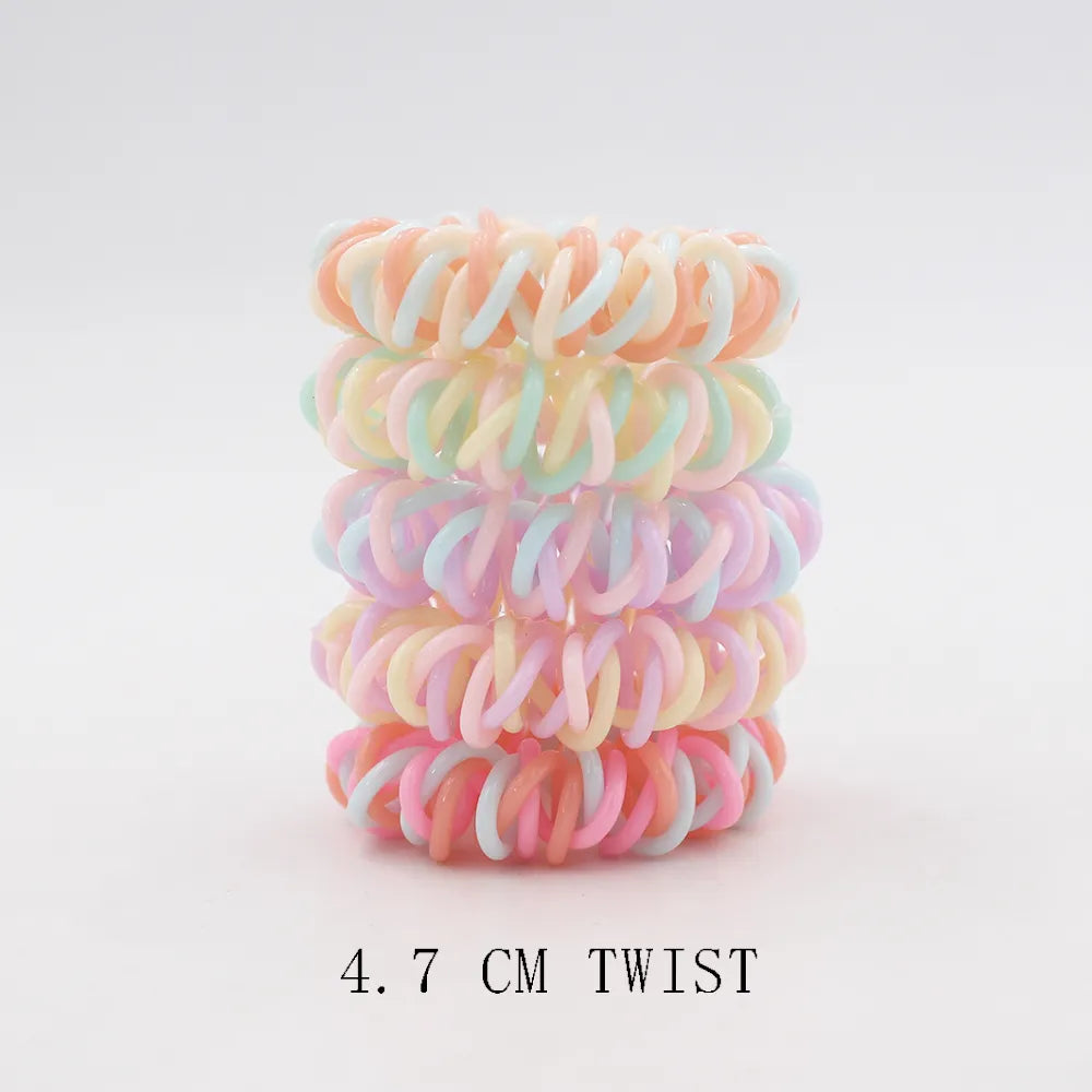 Frost Flex Chic Coil Collection: 5Pcs Matt Solid Telephone Wire Elastic Hair Bands. Hairxza Hair Accessories. Hair accessories in USA. Bride accessories in USA. Bridal hair accessories in USA. Kids hair accessories in USA. Girls hair accessories. Hair products. Beautiful hair accessories.