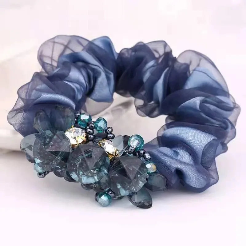 Dazzling Petal Elegance: Crystal-Embellished Floral Fabric Scrunchies. Hair accessories for brides.. Hair accessories in USA. Bride accessories in USA. Bridal hair accessories in USA. Kids hair accessories in USA. Girls hair accessories. Hair products. Beautiful hair accessories.