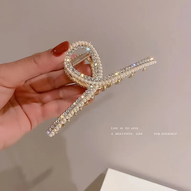 DazzlingPearl Elegance: Non-Slip Shark Claw Hair Clip. Hair accessories for brides.. Hair accessories in USA. Bride accessories in USA. Bridal hair accessories in USA. Kids hair accessories in USA. Girls hair accessories. Hair products. Beautiful hair accessories.