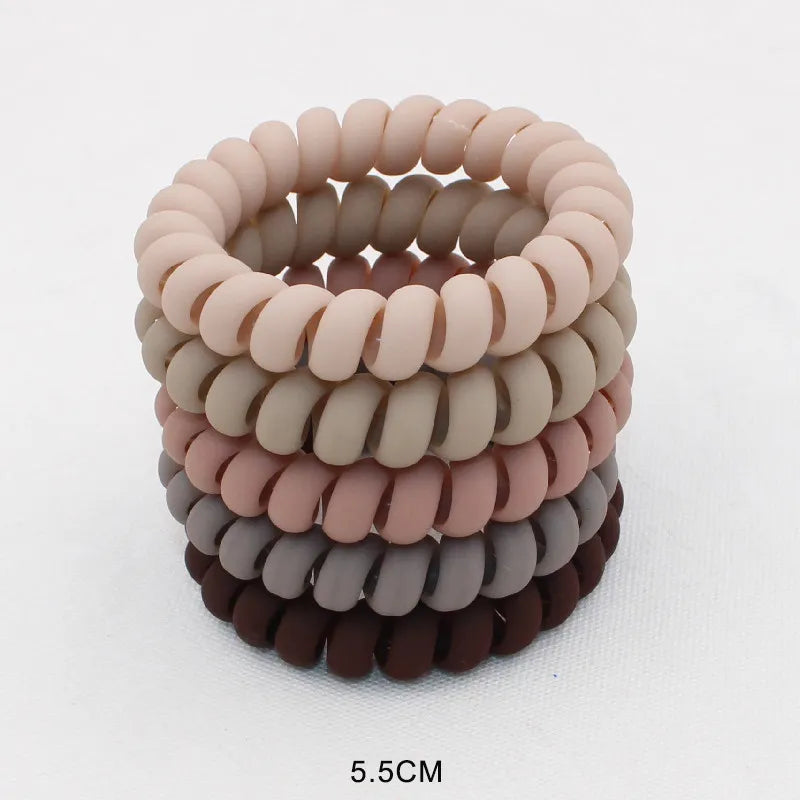 Frost Flex Chic Coil Collection: 5Pcs Matt Solid Telephone Wire Elastic Hair Bands. Hairxza Hair Accessories. Hair accessories in USA. Bride accessories in USA. Bridal hair accessories in USA. Kids hair accessories in USA. Girls hair accessories. Hair products. Beautiful hair accessories.