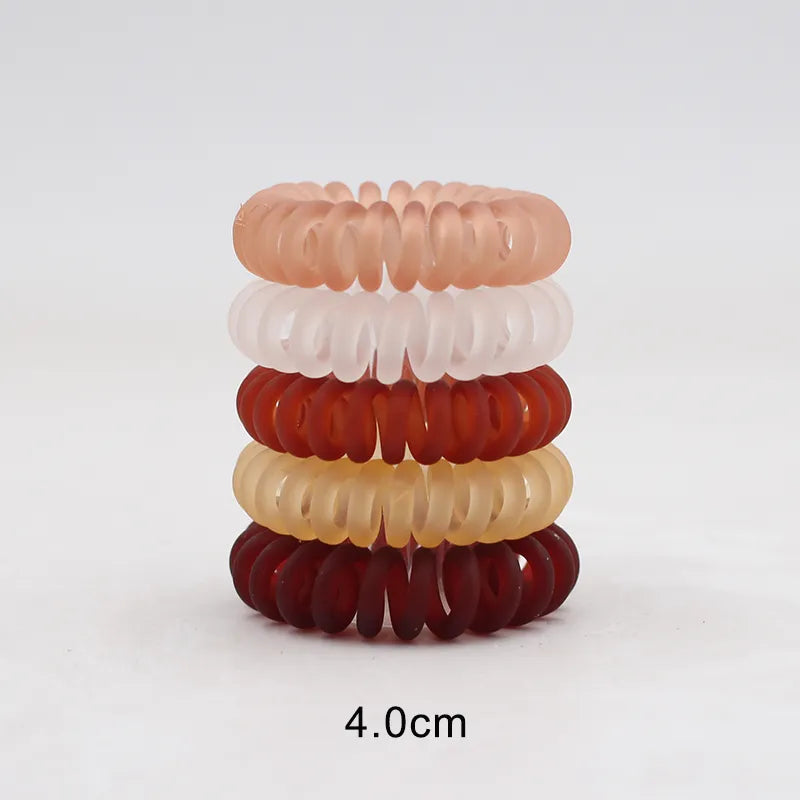 Frost Flex Chic Coil Collection: 5Pcs Matt Solid Telephone Wire Elastic Hair Bands. Hairxza Hair Accessories. Hair accessories in USA. Bride accessories in USA. Bridal hair accessories in USA. Kids hair accessories in USA. Girls hair accessories. Hair products. Beautiful hair accessories.