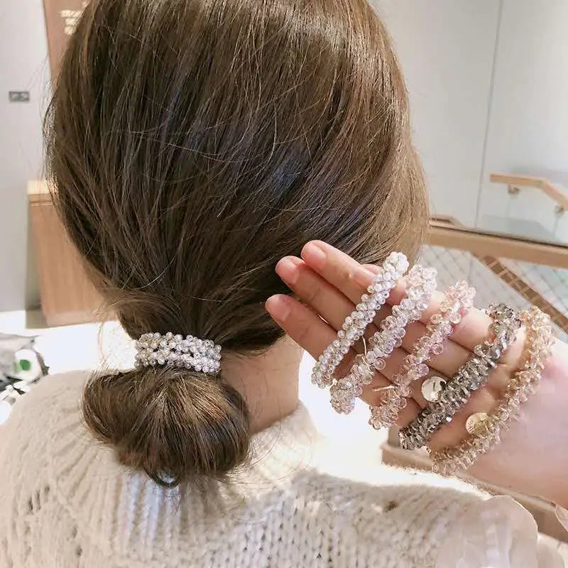 LuxeBraid Crystal Elegance: Handmade Pearl & Crystal Elastic Hair Rope. Hair accessories for brides.. Hair accessories in USA. Bride accessories in USA. Bridal hair accessories in USA. Kids hair accessories in USA. Girls hair accessories. Hair products. Beautiful hair accessories.