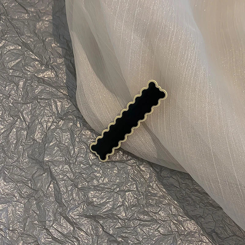 Monochrome Elegance: Retro Grid Acrylic Side Clip. Hair accessories for brides. Hair accessories in USA. Bride accessories in USA. Bridal hair accessories in USA. Kids hair accessories in USA. Girls hair accessories. Hair products. Beautiful hair accessories.