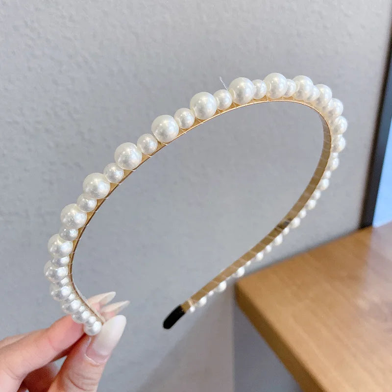 Pearl Elegance Harmony Headband. Hairxza Hair Accessories. Hair accessories in USA. Bride accessories in USA. Bridal hair accessories in USA. Kids hair accessories in USA. Girls hair accessories. Hair products. Beautiful hair accessories.