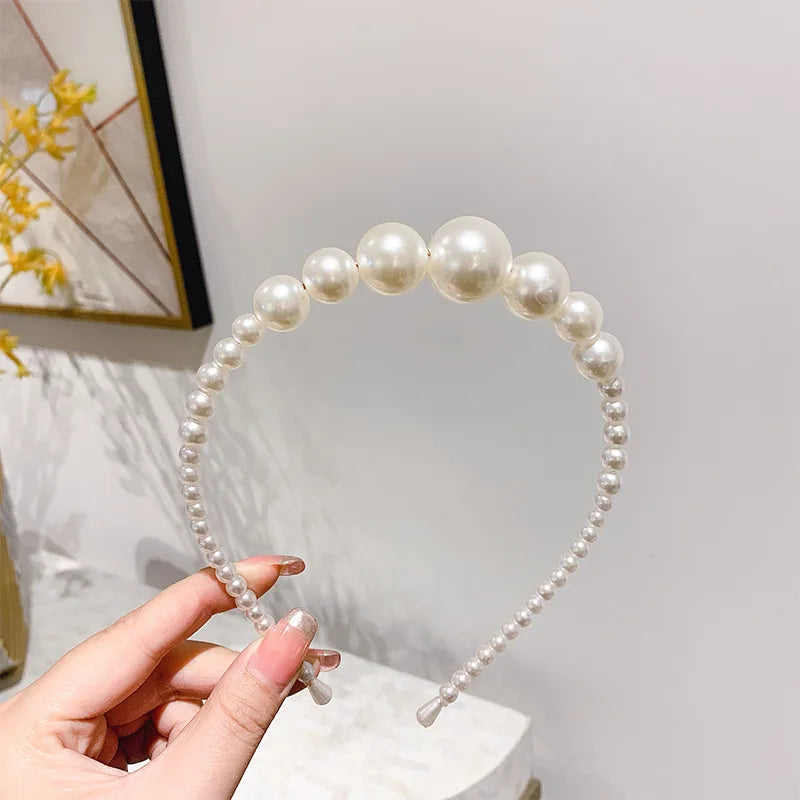 Pearl Elegance Harmony Headband. Hairxza Hair Accessories. Hair accessories in USA. Bride accessories in USA. Bridal hair accessories in USA. Kids hair accessories in USA. Girls hair accessories. Hair products. Beautiful hair accessories.