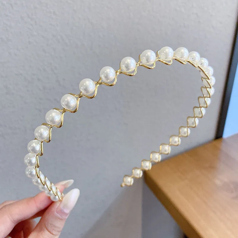 Pearl Elegance Harmony Headband. Hairxza Hair Accessories. Hair accessories in USA. Bride accessories in USA. Bridal hair accessories in USA. Kids hair accessories in USA. Girls hair accessories. Hair products. Beautiful hair accessories.