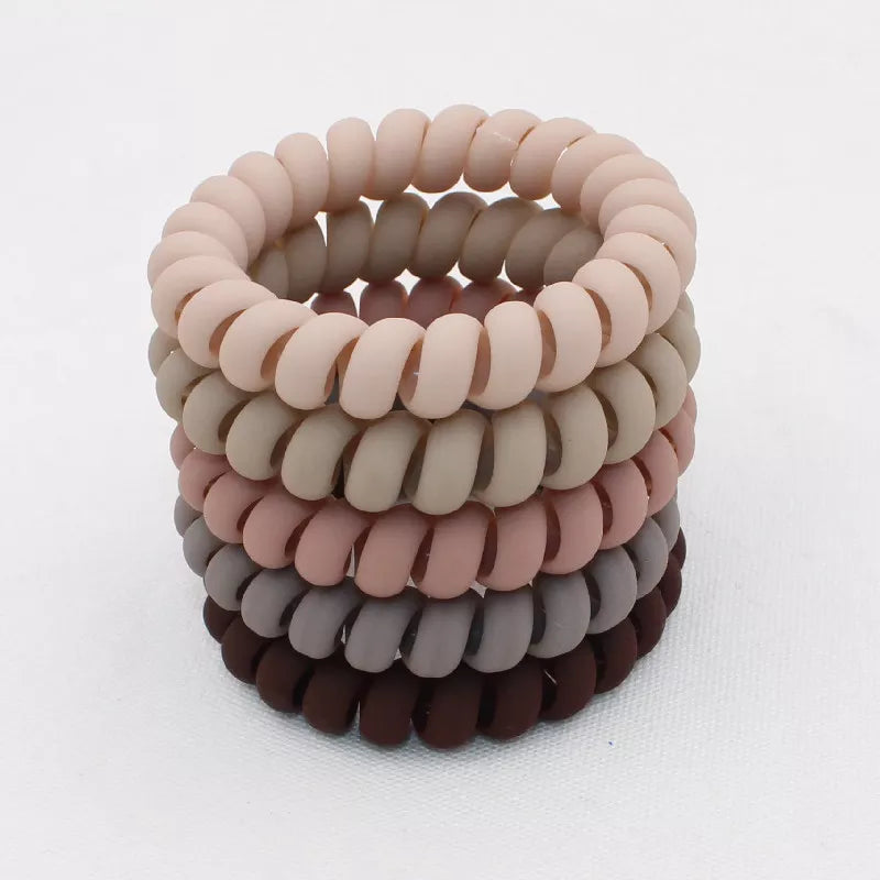 Frost Flex Chic Coil Collection: 5Pcs Matt Solid Telephone Wire Elastic Hair Bands. Hairxza Hair Accessories. Hair accessories in USA. Bride accessories in USA. Bridal hair accessories in USA. Kids hair accessories in USA. Girls hair accessories. Hair products. Beautiful hair accessories.