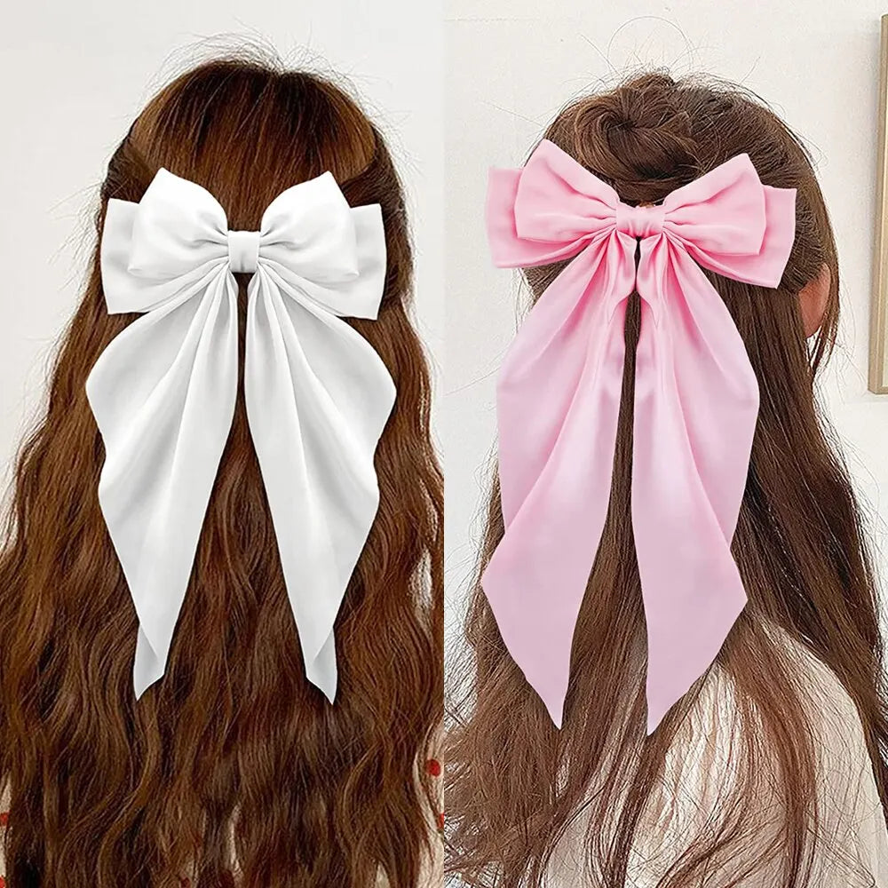 Chic Ribbon Elegance: 2-Piece Satin Bow Hair Clip Set. Hair accessories in USA. Bride accessories in USA. Bridal hair accessories in USA. Kids hair accessories in USA. Girls hair accessories. Hair products. Beautiful hair accessories.