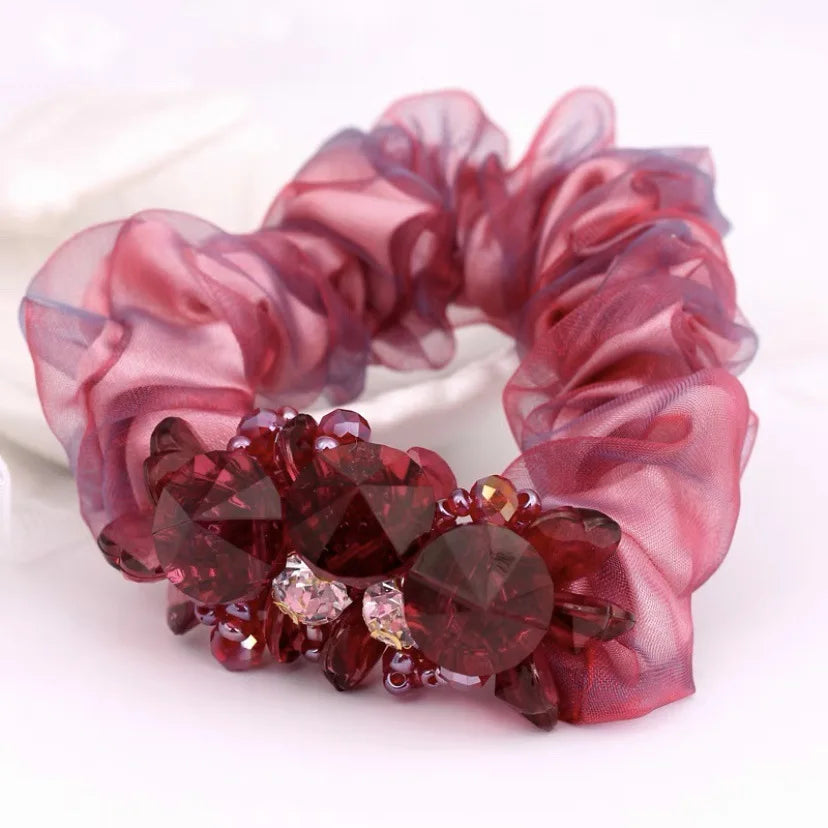 Dazzling Petal Elegance: Crystal-Embellished Floral Fabric Scrunchies. Hair accessories for brides.. Hair accessories in USA. Bride accessories in USA. Bridal hair accessories in USA. Kids hair accessories in USA. Girls hair accessories. Hair products. Beautiful hair accessories.