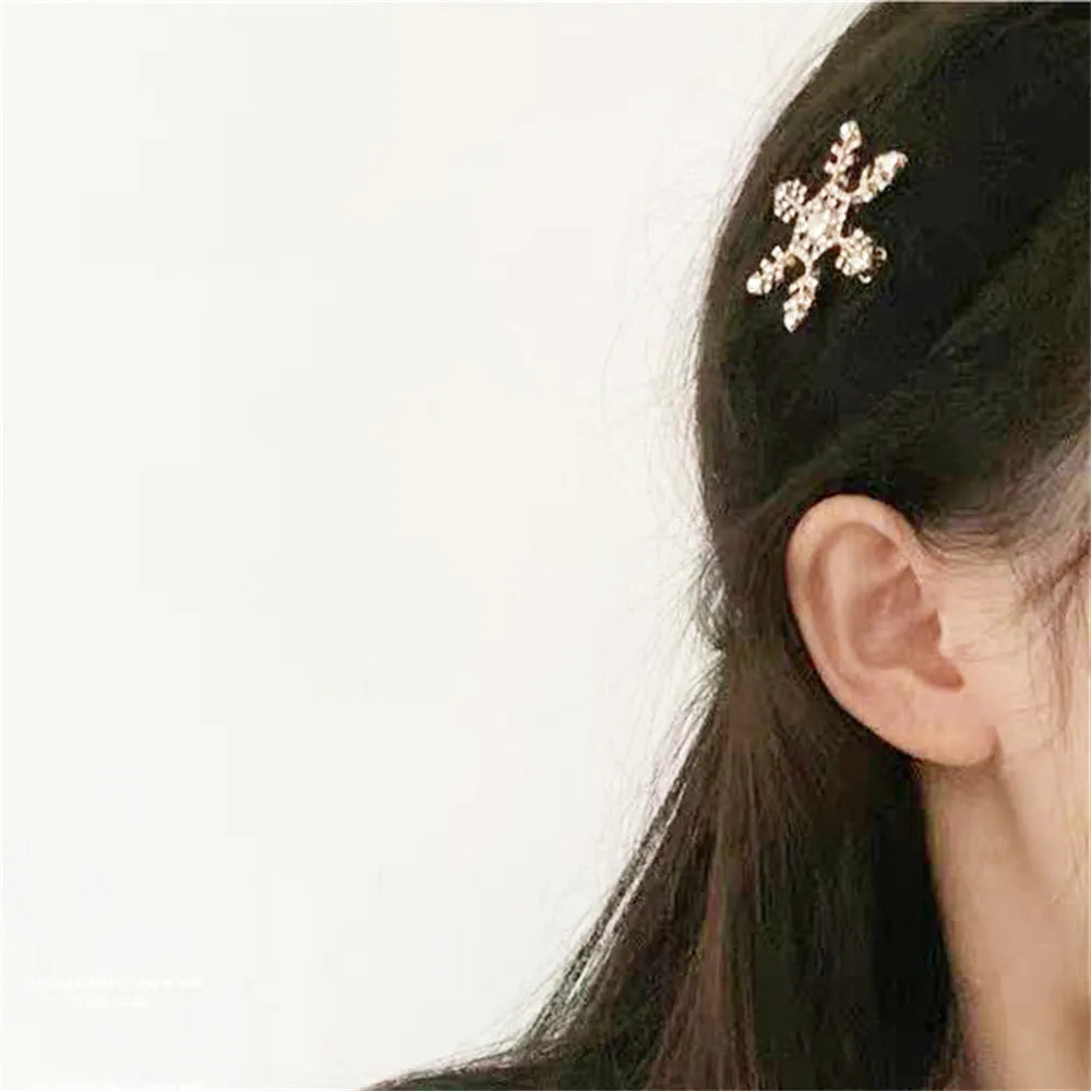 FrostFlare Crystal Elegance: Snowflake Sparkle Hair Clips. Hairxza Hair Accessories. Hair accessories in USA. Bride accessories in USA. Bridal hair accessories in USA. Kids hair accessories in USA. Girls hair accessories. Hair products. Beautiful hair accessories.