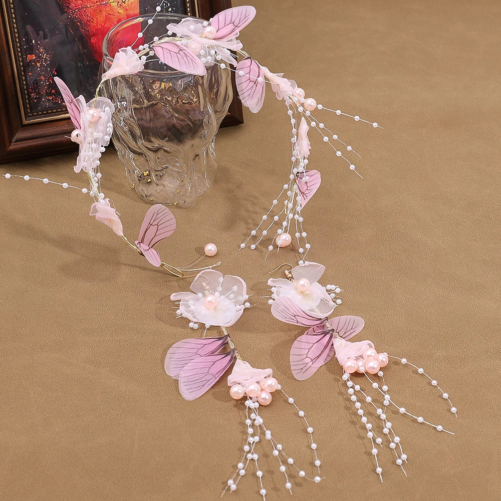 Pearl Petal Radiance: Elegant Floral Bridal Headband. Hairxza Hair Accessories. Hair accessories in USA. Bride accessories in USA. Bridal hair accessories in USA. Kids hair accessories in USA. Girls hair accessories. Hair products. Beautiful hair accessories