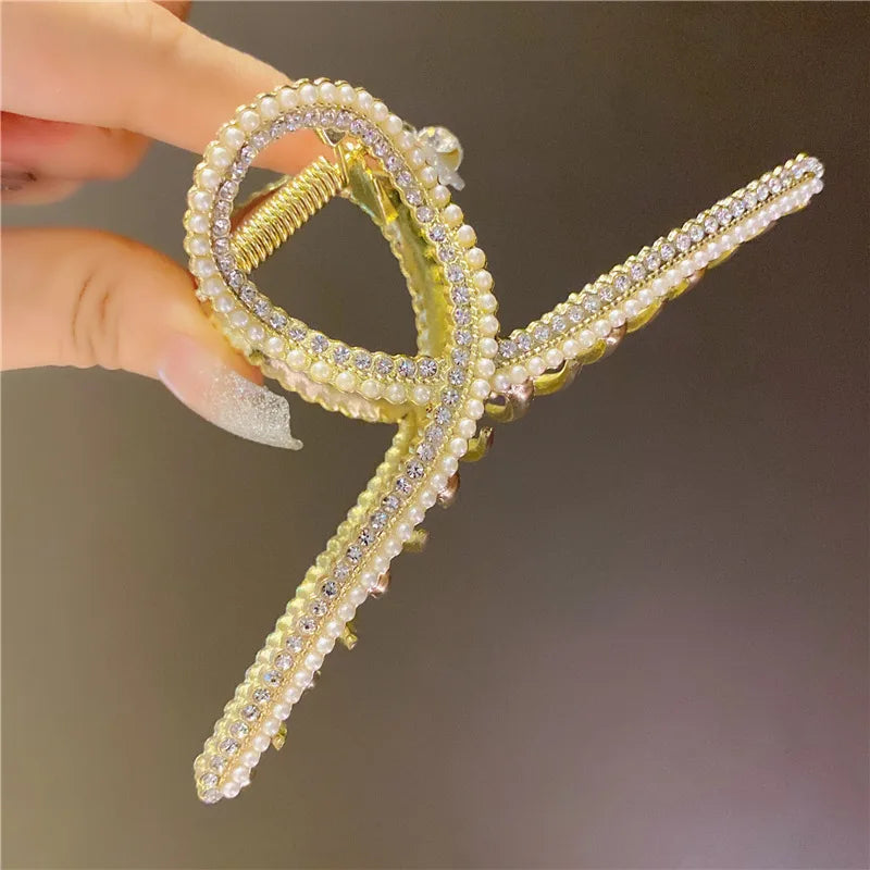 DazzlingPearl Elegance: Non-Slip Shark Claw Hair Clip. Hair accessories for brides.. Hair accessories in USA. Bride accessories in USA. Bridal hair accessories in USA. Kids hair accessories in USA. Girls hair accessories. Hair products. Beautiful hair accessories.