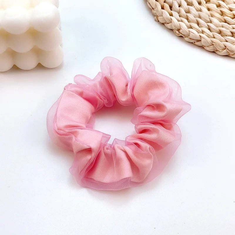 Dazzling Petal Elegance: Crystal-Embellished Floral Fabric Scrunchies. Hair accessories for brides.. Hair accessories in USA. Bride accessories in USA. Bridal hair accessories in USA. Kids hair accessories in USA. Girls hair accessories. Hair products. Beautiful hair accessories.