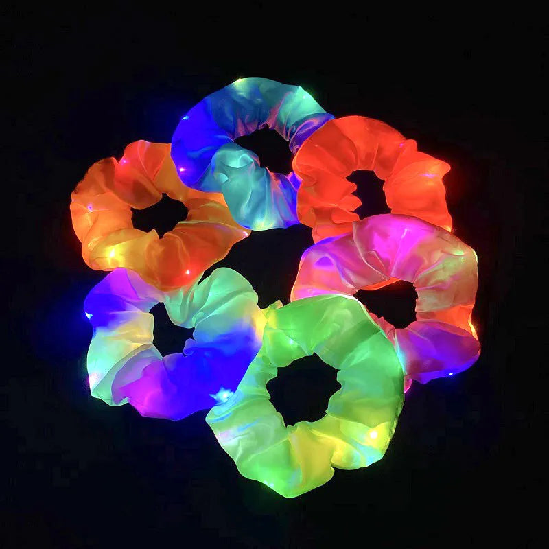 RadiantRipples: The Ultimate LED Glow Hair Scrunchie Collection. Hairxza Hair Accessories. Hair accessories in USA. Bride accessories in USA. Bridal hair accessories in USA. Kids hair accessories in USA. Girls hair accessories. Hair products. Beautiful hair accessories.