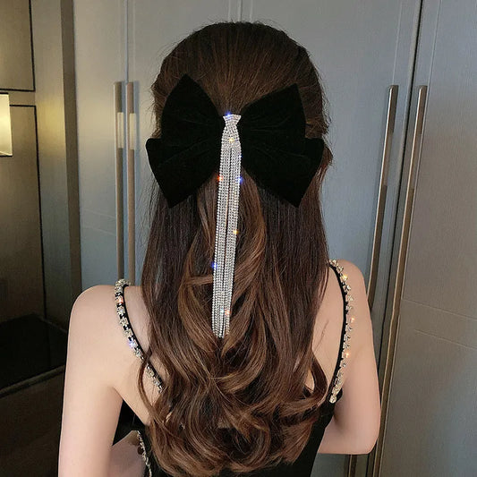 Luxe velvet Elegance: Crystal Cascade Bow Hairpin. Hair accessories in USA. Bride accessories in USA. Bridal hair accessories in USA. Kids hair accessories in USA. Girls hair accessories. Hair products. Beautiful hair accessories.