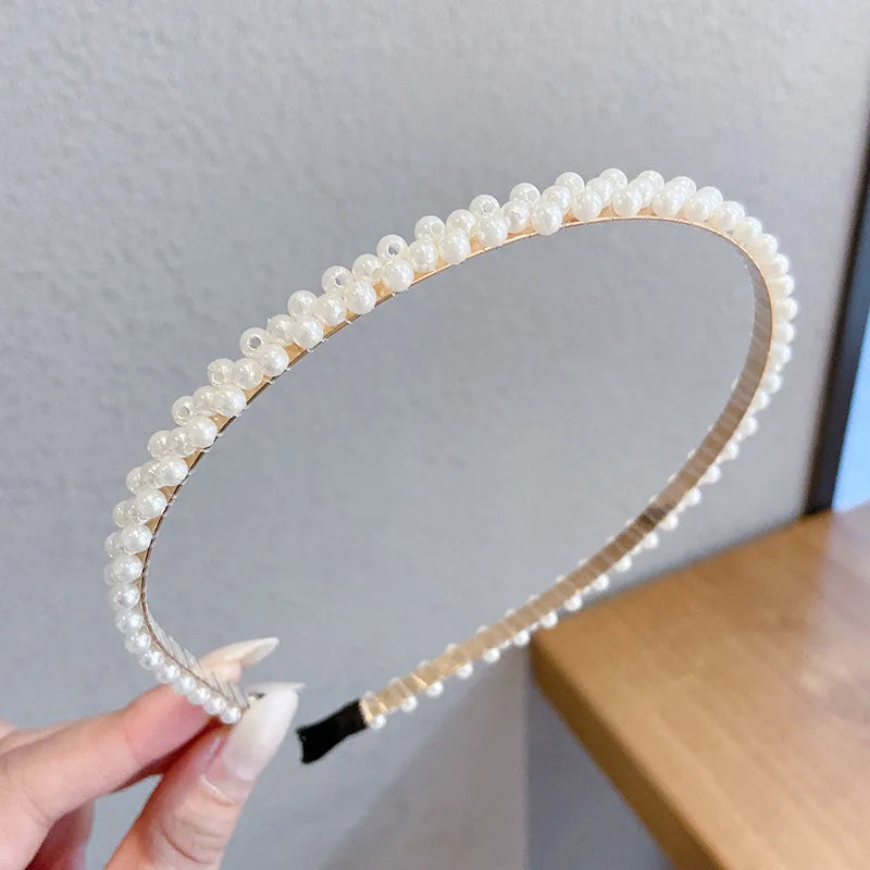 Pearl Elegance Harmony Headband. Hairxza Hair Accessories. Hair accessories in USA. Bride accessories in USA. Bridal hair accessories in USA. Kids hair accessories in USA. Girls hair accessories. Hair products. Beautiful hair accessories.