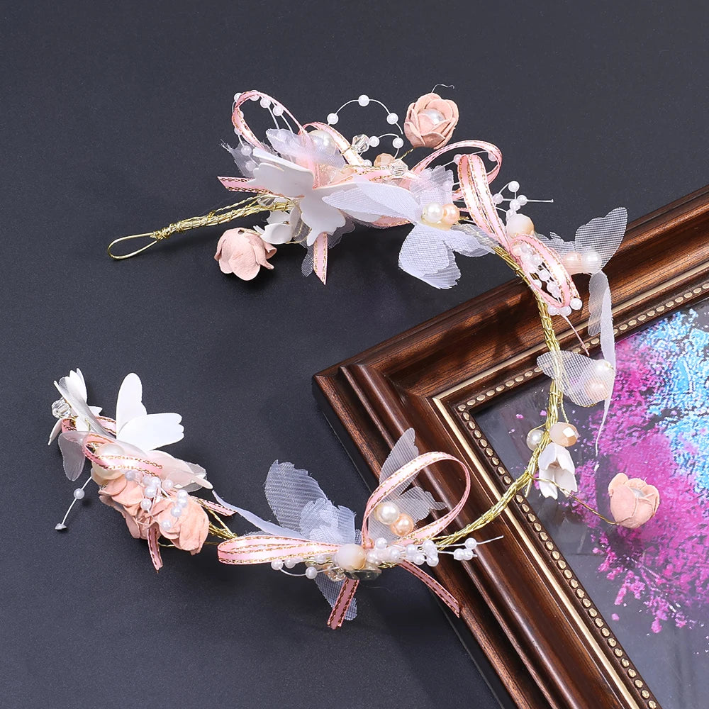 Pearl Petal Radiance: Elegant Floral Bridal Headband. Hairxza Hair Accessories. Hair accessories in USA. Bride accessories in USA. Bridal hair accessories in USA. Kids hair accessories in USA. Girls hair accessories. Hair products. Beautiful hair accessories