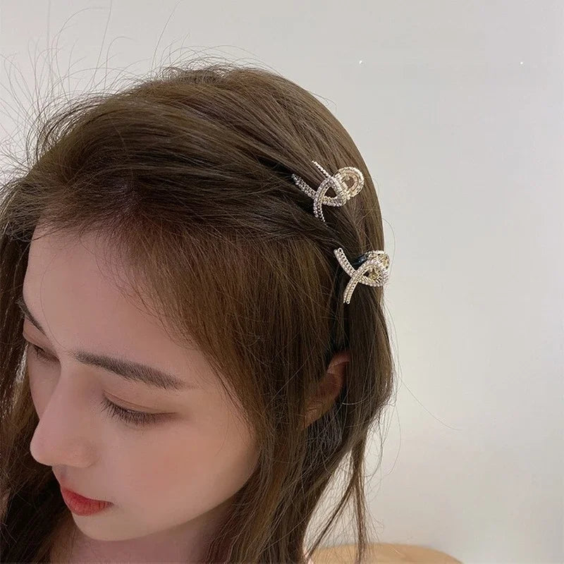 PearlRadiance Duo: Metal Elegance Hair Clips. Hairxza Hair Accessories. Hair accessories in USA. Bride accessories in USA. Bridal hair accessories in USA. Kids hair accessories in USA. Girls hair accessories. Hair products. Beautiful hair accessories.