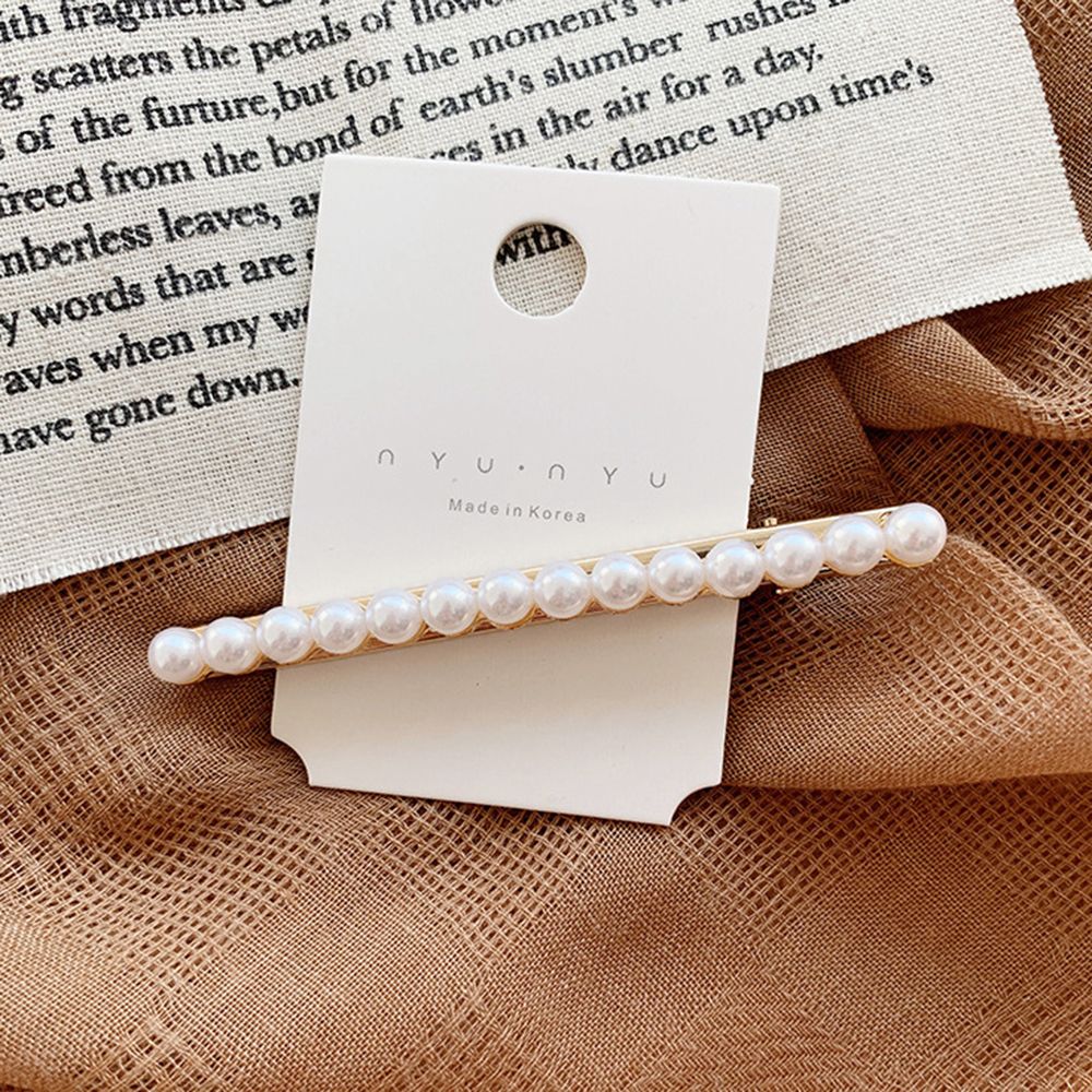 Pearl Adorn Hair Clips. Hair accessory. Hairxza Hair Accessories. Hair accessories in USA. Bride accessories in USA. Bridal hair accessories in USA. Kids hair accessories in USA. Girls hair accessories. Hair products. Beautiful hair accessories.