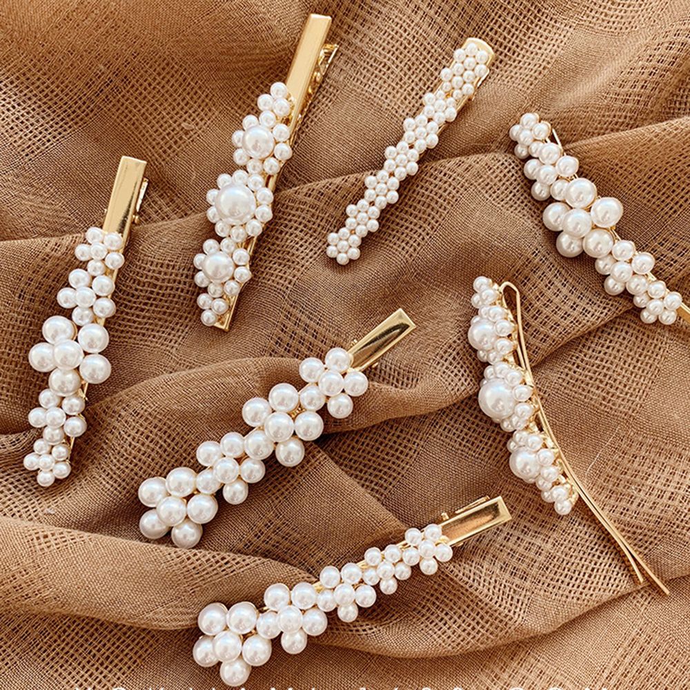 Pearl Adorn Hair Clips. Hair accessory. Hairxza Hair Accessories. Hair accessories in USA. Bride accessories in USA. Bridal hair accessories in USA. Kids hair accessories in USA. Girls hair accessories. Hair products. Beautiful hair accessories.