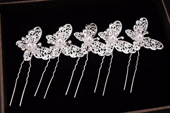 Radiant Pearl Butterfly Hairpins. Bridal Wedding hair accessory. Bridal hair Accessory. Wedding bridal hair combs. Hair accessories for brides. Hair accessories in USA. Bride accessories in USA. Bridal hair accessories in USA. Kids hair accessories in USA. Girls hair accessories. Hair products. Beautiful hair accessories.