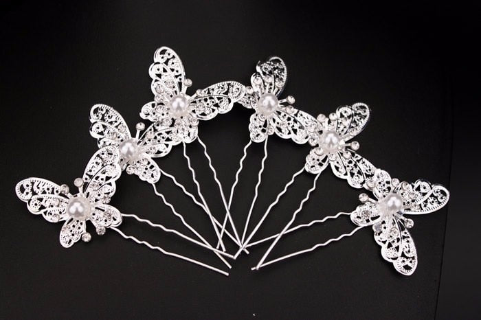 Radiant Pearl Butterfly Hairpins. Bridal Wedding hair accessory. Bridal hair Accessory. Wedding bridal hair combs. Hair accessories for brides. Hair accessories in USA. Bride accessories in USA. Bridal hair accessories in USA. Kids hair accessories in USA. Girls hair accessories. Hair products. Beautiful hair accessories.