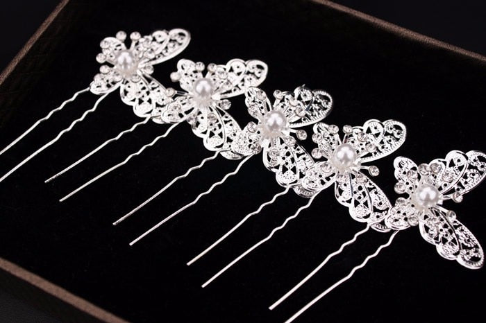 Radiant Pearl Butterfly Hairpins. Bridal Wedding hair accessory. Bridal hair Accessory. Wedding bridal hair combs. Hair accessories for brides. Hair accessories in USA. Bride accessories in USA. Bridal hair accessories in USA. Kids hair accessories in USA. Girls hair accessories. Hair products. Beautiful hair accessories.