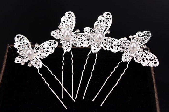 Radiant Pearl Butterfly Hairpins. Bridal Wedding hair accessory. Bridal hair Accessory. Wedding bridal hair combs. Hair accessories for brides. Hair accessories in USA. Bride accessories in USA. Bridal hair accessories in USA. Kids hair accessories in USA. Girls hair accessories. Hair products. Beautiful hair accessories.