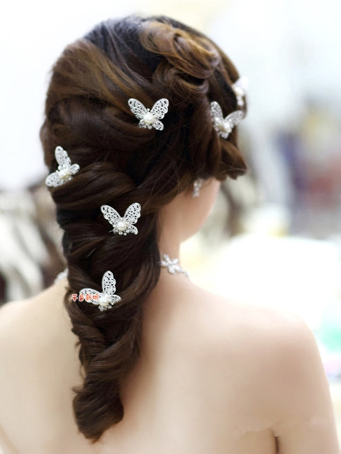 Radiant Pearl Butterfly Hairpins. Bridal Wedding hair accessory. Bridal hair Accessory. Wedding bridal hair combs. Hair accessories for brides. Hair accessories in USA. Bride accessories in USA. Bridal hair accessories in USA. Kids hair accessories in USA. Girls hair accessories. Hair products. Beautiful hair accessories.