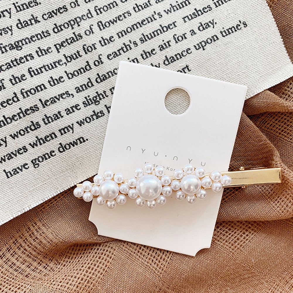 Pearl Adorn Hair Clips. Hair accessory. Hairxza Hair Accessories. Hair accessories in USA. Bride accessories in USA. Bridal hair accessories in USA. Kids hair accessories in USA. Girls hair accessories. Hair products. Beautiful hair accessories.