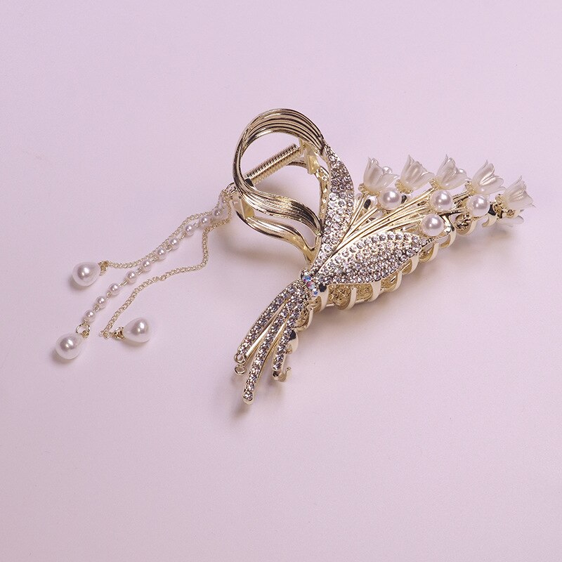 Pearl & Tassel Glam Hair Clips. Hairxza Hair Accessories. Hair accessories in USA. Bride accessories in USA. Bridal hair accessories in USA. Kids hair accessories in USA. Girls hair accessories. Hair products. Beautiful hair accessories.