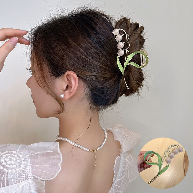 Orchid Flower Hair Clip. Elegant beautiful flower hair clips. Flower Hair accessory. Hair accessories for brides. Hair accessories in USA. Bride accessories in USA. Bridal hair accessories in USA. Kids hair accessories in USA. Girls hair accessories. Hair products. Beautiful hair accessories.