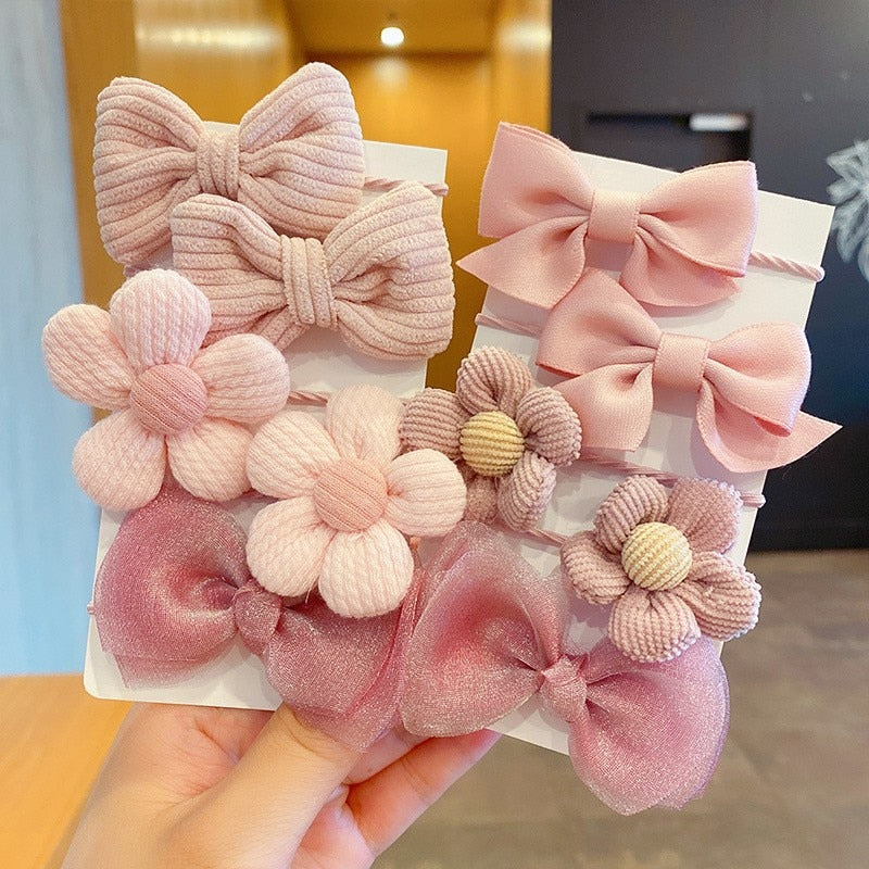 Bow Bloom Hairties. Girls Hair ties.Hair accessories for brides.. Hair accessories in USA. Bride accessories in USA. Bridal hair accessories in USA. Kids hair accessories in USA. Girls hair accessories. Hair products. Beautiful hair accessories.