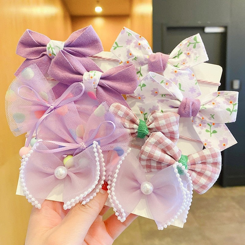 Bow Bloom Hairties. Girls Hair ties.Hair accessories for brides.. Hair accessories in USA. Bride accessories in USA. Bridal hair accessories in USA. Kids hair accessories in USA. Girls hair accessories. Hair products. Beautiful hair accessories.