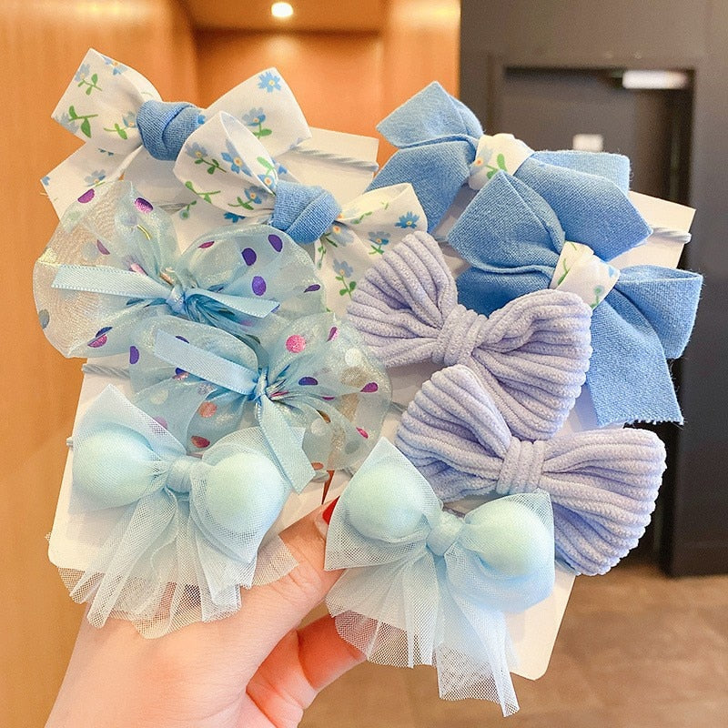 Bow Bloom Hairties. Girls Hair ties.Hair accessories for brides.. Hair accessories in USA. Bride accessories in USA. Bridal hair accessories in USA. Kids hair accessories in USA. Girls hair accessories. Hair products. Beautiful hair accessories.