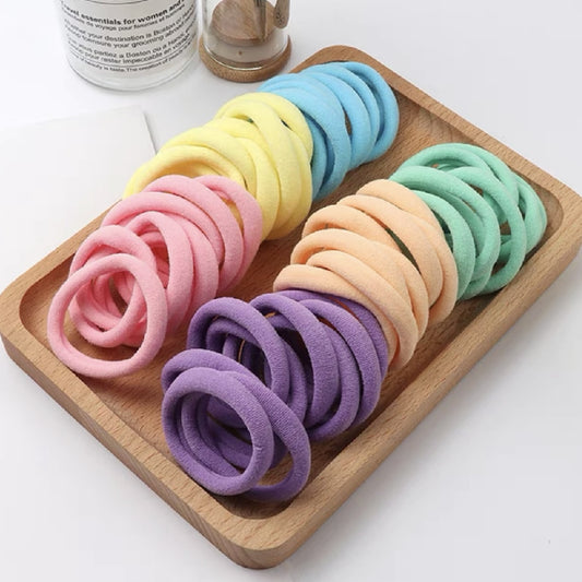 Rainbow Hair Ties - 50/100 Pack of Colorful Nylon Elastic Bands for Men and Women, 5cm Diameter Perfect for Thin Hair, Ponytails, and Hair Accessories. Hairxza Hair Accessories. Hair accessories in USA. Bride accessories in USA. Bridal hair accessories in USA. Kids hair accessories in USA. Girls hair accessories. Hair products. Beautiful hair accessories.