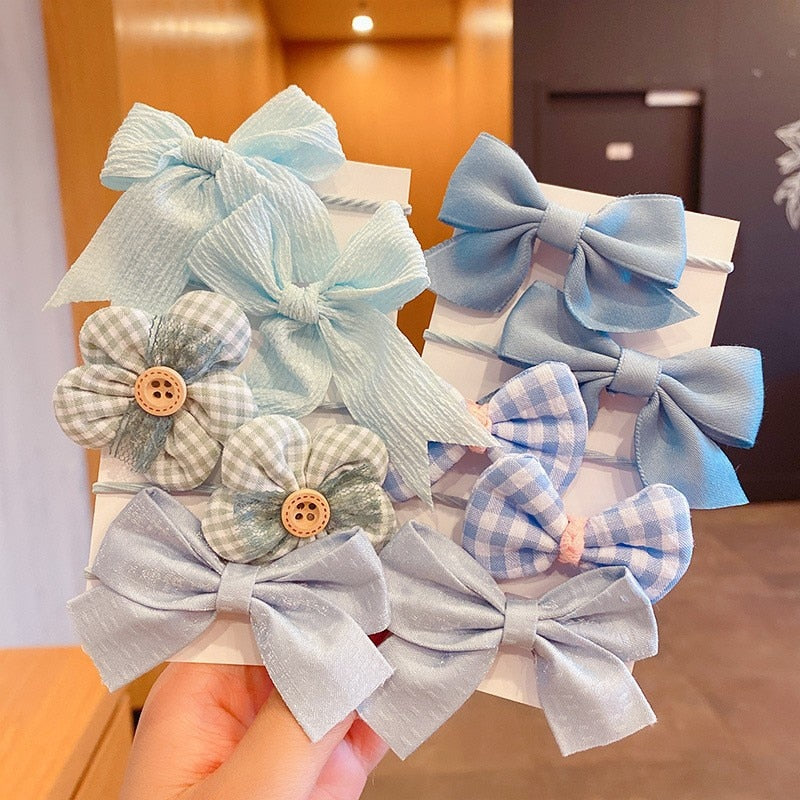 Bow Bloom Hairties. Girls Hair ties.Hair accessories for brides.. Hair accessories in USA. Bride accessories in USA. Bridal hair accessories in USA. Kids hair accessories in USA. Girls hair accessories. Hair products. Beautiful hair accessories.