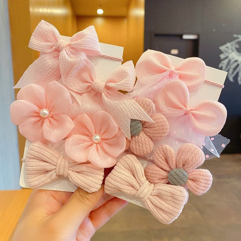 Bow Bloom Hairties. Girls Hair ties.Hair accessories for brides.. Hair accessories in USA. Bride accessories in USA. Bridal hair accessories in USA. Kids hair accessories in USA. Girls hair accessories. Hair products. Beautiful hair accessories.