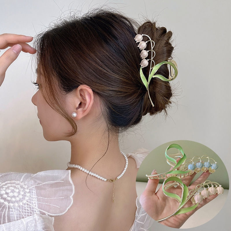 Orchid Flower Hair Clip. Elegant beautiful flower hair clips. Flower Hair accessory. Hair accessories for brides. Hair accessories in USA. Bride accessories in USA. Bridal hair accessories in USA. Kids hair accessories in USA. Girls hair accessories. Hair products. Beautiful hair accessories.