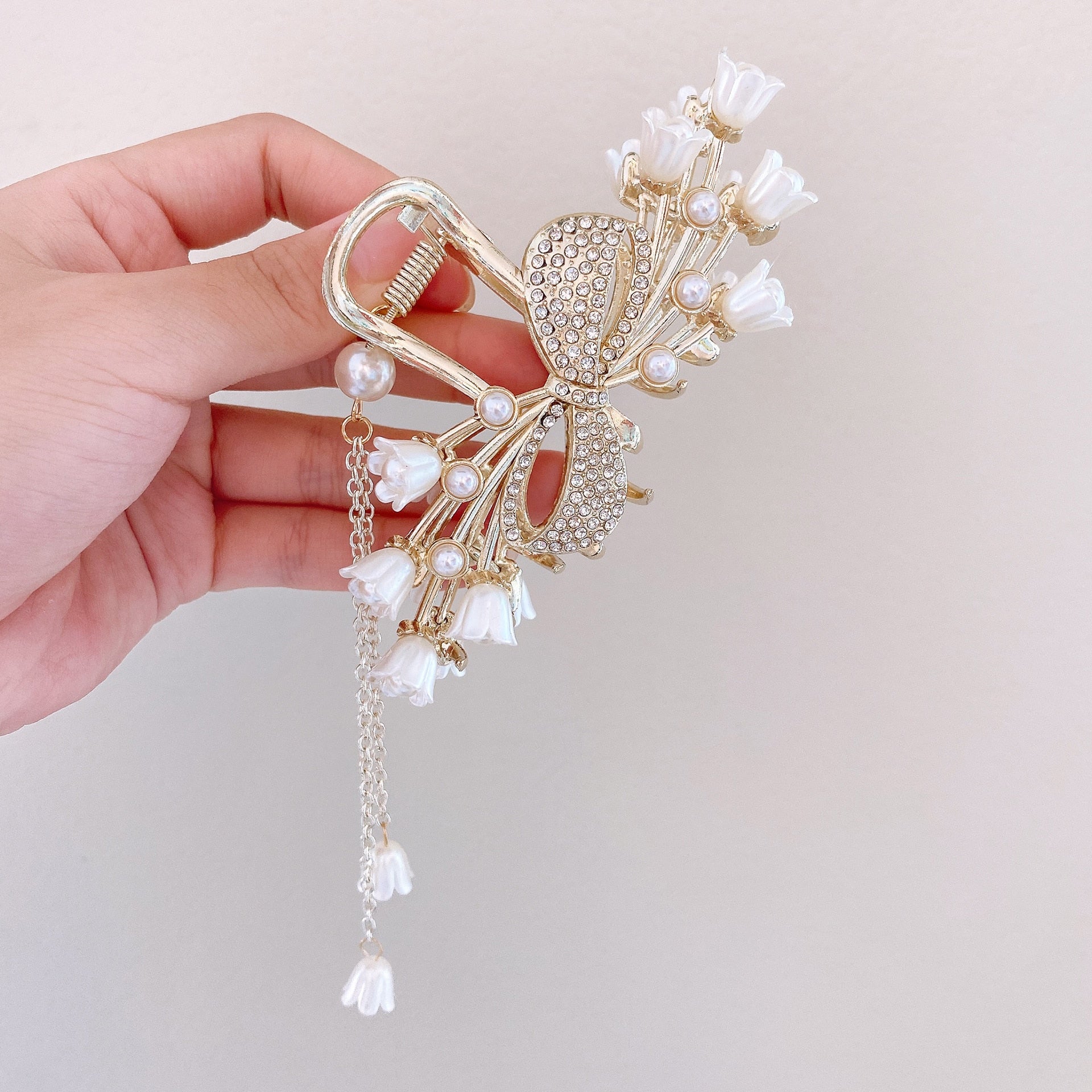 Pearl & Tassel Glam Hair Clips. Hairxza Hair Accessories. Hair accessories in USA. Bride accessories in USA. Bridal hair accessories in USA. Kids hair accessories in USA. Girls hair accessories. Hair products. Beautiful hair accessories.