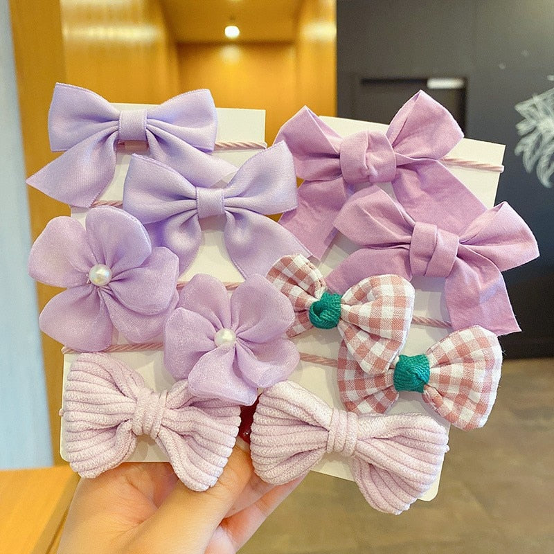 Bow Bloom Hairties. Girls Hair ties.Hair accessories for brides.. Hair accessories in USA. Bride accessories in USA. Bridal hair accessories in USA. Kids hair accessories in USA. Girls hair accessories. Hair products. Beautiful hair accessories.